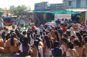Students performing a roadside drama on Save girl Child and education awareness