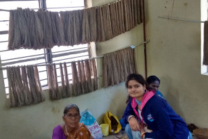 Student with tasar workshop worker