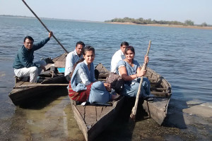 Students and staff while boating